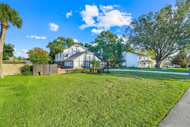 Not your cookie-cutter home.  This lovely Tudor offers character on Orange Tree Golf Club in Florida - for sale on GolfHomes.com, golf home, golf lot
