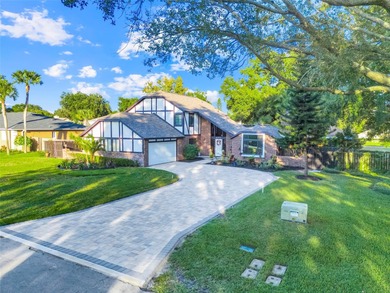 Not your cookie-cutter home.  This lovely Tudor offers character on Orange Tree Golf Club in Florida - for sale on GolfHomes.com, golf home, golf lot