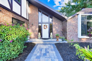 Not your cookie-cutter home.  This lovely Tudor offers character on Orange Tree Golf Club in Florida - for sale on GolfHomes.com, golf home, golf lot