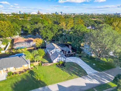 Not your cookie-cutter home.  This lovely Tudor offers character on Orange Tree Golf Club in Florida - for sale on GolfHomes.com, golf home, golf lot