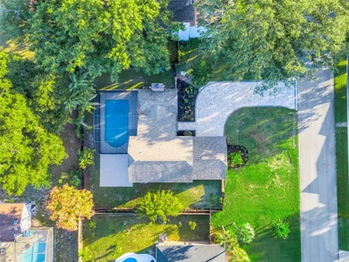 Not your cookie-cutter home.  This lovely Tudor offers character on Orange Tree Golf Club in Florida - for sale on GolfHomes.com, golf home, golf lot