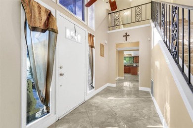 Not your cookie-cutter home.  This lovely Tudor offers character on Orange Tree Golf Club in Florida - for sale on GolfHomes.com, golf home, golf lot