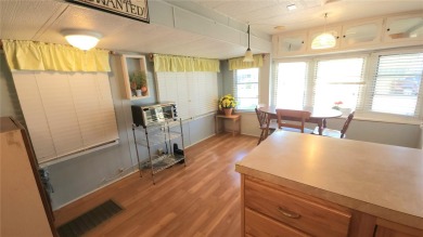 LOOKING FOR A FLORIDA GETAWAY? This cheerful one bed, 1 1/2 bath on River Run Golf Links in Florida - for sale on GolfHomes.com, golf home, golf lot