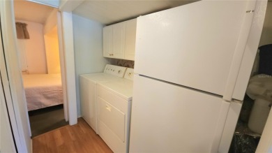 LOOKING FOR A FLORIDA GETAWAY? This cheerful one bed, 1 1/2 bath on River Run Golf Links in Florida - for sale on GolfHomes.com, golf home, golf lot