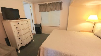 LOOKING FOR A FLORIDA GETAWAY? This cheerful one bed, 1 1/2 bath on River Run Golf Links in Florida - for sale on GolfHomes.com, golf home, golf lot