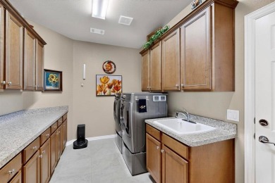 Experience comfort and elegance in this beautifully designed on Wildhorse Golf Club of Robson Ranch in Texas - for sale on GolfHomes.com, golf home, golf lot