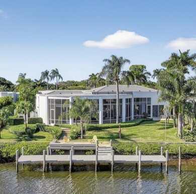 This exceptional home is a classic modern design proving the on Frenchmans Creek Country Club in Florida - for sale on GolfHomes.com, golf home, golf lot