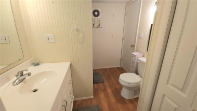 LOOKING FOR A FLORIDA GETAWAY? This cheerful one bed, 1 1/2 bath on River Run Golf Links in Florida - for sale on GolfHomes.com, golf home, golf lot
