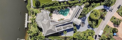 This exceptional home is a classic modern design proving the on Frenchmans Creek Country Club in Florida - for sale on GolfHomes.com, golf home, golf lot