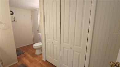 LOOKING FOR A FLORIDA GETAWAY? This cheerful one bed, 1 1/2 bath on River Run Golf Links in Florida - for sale on GolfHomes.com, golf home, golf lot