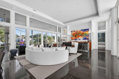 This exceptional home is a classic modern design proving the on Frenchmans Creek Country Club in Florida - for sale on GolfHomes.com, golf home, golf lot