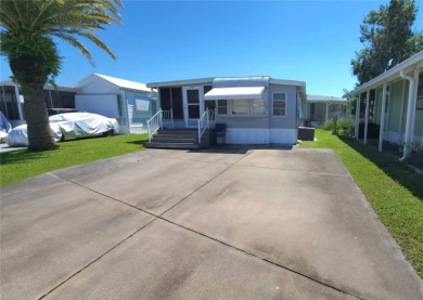 LOOKING FOR A FLORIDA GETAWAY? This cheerful one bed, 1 1/2 bath on River Run Golf Links in Florida - for sale on GolfHomes.com, golf home, golf lot