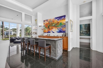 This exceptional home is a classic modern design proving the on Frenchmans Creek Country Club in Florida - for sale on GolfHomes.com, golf home, golf lot