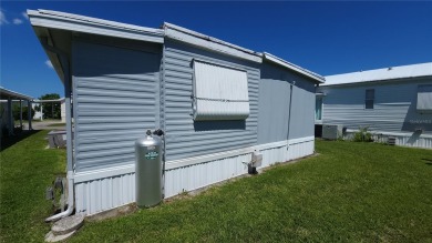 LOOKING FOR A FLORIDA GETAWAY? This cheerful one bed, 1 1/2 bath on River Run Golf Links in Florida - for sale on GolfHomes.com, golf home, golf lot