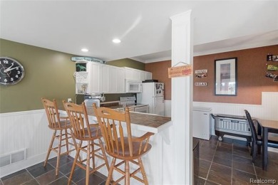 Stunning golf-frontage home overlooking the 12th hole, combining on Copper Ridge Golf Club in Michigan - for sale on GolfHomes.com, golf home, golf lot
