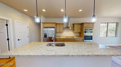 New custom home in the Torreon-Lakes community, built by Dean on Torreon Golf Club in Arizona - for sale on GolfHomes.com, golf home, golf lot
