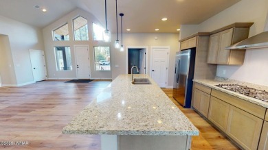 New custom home in the Torreon-Lakes community, built by Dean on Torreon Golf Club in Arizona - for sale on GolfHomes.com, golf home, golf lot