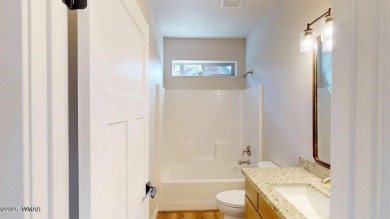 New custom home in the Torreon-Lakes community, built by Dean on Torreon Golf Club in Arizona - for sale on GolfHomes.com, golf home, golf lot
