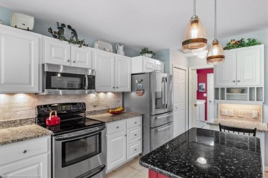 TURNKEY! BEAUTIFULLY DECORATED & FURNISHED! Open plan with two on Highlands Ridge Golf Course - South in Florida - for sale on GolfHomes.com, golf home, golf lot