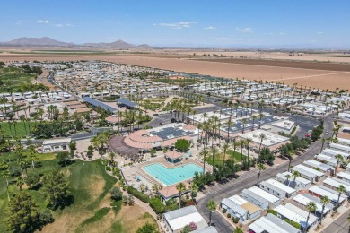 Welcome to your sunny desert retreat in the sought-after Palm on Palm Creek Golf and RV Resort in Arizona - for sale on GolfHomes.com, golf home, golf lot