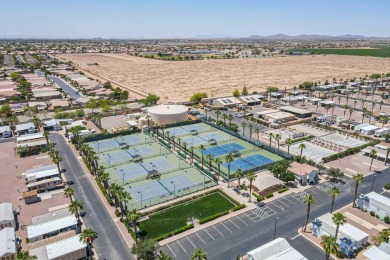 Welcome to your sunny desert retreat in the sought-after Palm on Palm Creek Golf and RV Resort in Arizona - for sale on GolfHomes.com, golf home, golf lot