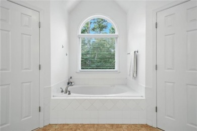 Beautifully situated BridgeMill home less than 1 mile from the on Bridgemill Golf Club in Georgia - for sale on GolfHomes.com, golf home, golf lot
