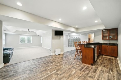 Beautifully situated BridgeMill home less than 1 mile from the on Bridgemill Golf Club in Georgia - for sale on GolfHomes.com, golf home, golf lot
