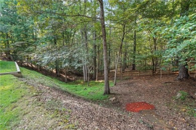 Beautifully situated BridgeMill home less than 1 mile from the on Bridgemill Golf Club in Georgia - for sale on GolfHomes.com, golf home, golf lot