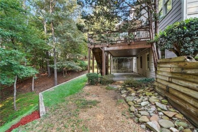 Beautifully situated BridgeMill home less than 1 mile from the on Bridgemill Golf Club in Georgia - for sale on GolfHomes.com, golf home, golf lot