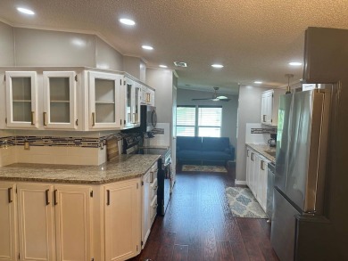 LOCATED IN HIGHLY SOUGHT FIVE-STAR COMMUNITY FOUR LAKES GOLF on Four Lakes Golf Club in Florida - for sale on GolfHomes.com, golf home, golf lot