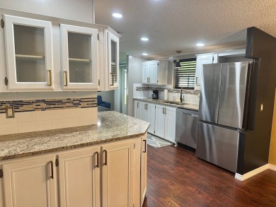 LOCATED IN HIGHLY SOUGHT FIVE-STAR COMMUNITY FOUR LAKES GOLF on Four Lakes Golf Club in Florida - for sale on GolfHomes.com, golf home, golf lot