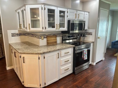 LOCATED IN HIGHLY SOUGHT FIVE-STAR COMMUNITY FOUR LAKES GOLF on Four Lakes Golf Club in Florida - for sale on GolfHomes.com, golf home, golf lot