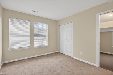Welcome to this spacious 4-bedroom home on the water in on Kiln Creek Golf and Country Club in Virginia - for sale on GolfHomes.com, golf home, golf lot