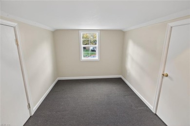 Welcome to this spacious 4-bedroom home on the water in on Kiln Creek Golf and Country Club in Virginia - for sale on GolfHomes.com, golf home, golf lot