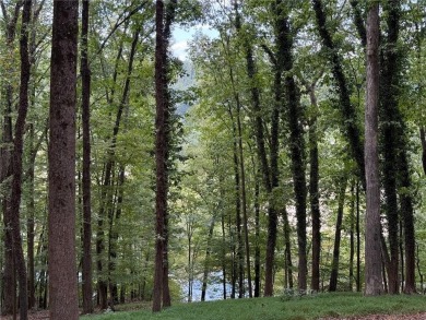Renovated river house on the Chattahoochee River. This home on Cherokee Town and Country Club in Georgia - for sale on GolfHomes.com, golf home, golf lot