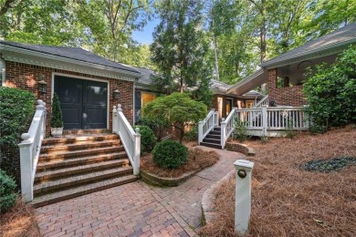 Renovated river house on the Chattahoochee River. This home on Cherokee Town and Country Club in Georgia - for sale on GolfHomes.com, golf home, golf lot