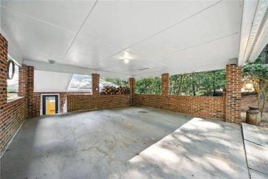 Renovated river house on the Chattahoochee River. This home on Cherokee Town and Country Club in Georgia - for sale on GolfHomes.com, golf home, golf lot