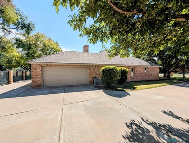There's a golf course just beyond the backyard! Located on one on Chaparral Country Club in New Mexico - for sale on GolfHomes.com, golf home, golf lot