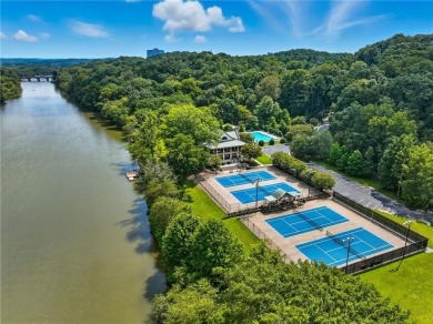 Renovated river house on the Chattahoochee River. This home on Cherokee Town and Country Club in Georgia - for sale on GolfHomes.com, golf home, golf lot