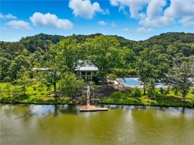 Renovated river house on the Chattahoochee River. This home on Cherokee Town and Country Club in Georgia - for sale on GolfHomes.com, golf home, golf lot
