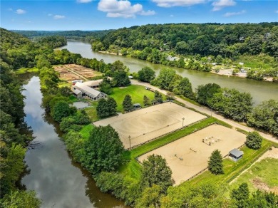 Renovated river house on the Chattahoochee River. This home on Cherokee Town and Country Club in Georgia - for sale on GolfHomes.com, golf home, golf lot
