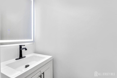 Welcome to this beautifully updated 2-bedroom, 3-bathroom home on Greenbriar At Whittingham in New Jersey - for sale on GolfHomes.com, golf home, golf lot