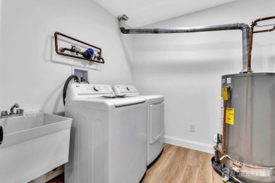 Welcome to this beautifully updated 2-bedroom, 3-bathroom home on Greenbriar At Whittingham in New Jersey - for sale on GolfHomes.com, golf home, golf lot