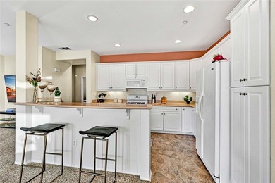 Welcome to a home designed for effortless living. Nestled within on Mile Square Golf Course in California - for sale on GolfHomes.com, golf home, golf lot