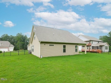 Nestled on a picturesque golf course lot, this thoughtfully on Olde Liberty Golf and Country Club in North Carolina - for sale on GolfHomes.com, golf home, golf lot