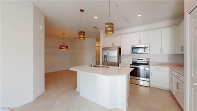 Top-floor privacy meets premium end-unit luxury in this on Babcock National Golf Course in Florida - for sale on GolfHomes.com, golf home, golf lot