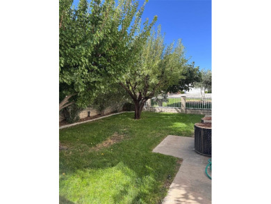 Beautifully maintained and cared for 5 bedroom 3 bath home in on Spring Valley Lake Country Club in California - for sale on GolfHomes.com, golf home, golf lot