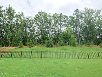 Nestled on a picturesque golf course lot, this thoughtfully on Olde Liberty Golf and Country Club in North Carolina - for sale on GolfHomes.com, golf home, golf lot