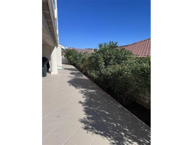 Beautifully maintained and cared for 5 bedroom 3 bath home in on Spring Valley Lake Country Club in California - for sale on GolfHomes.com, golf home, golf lot