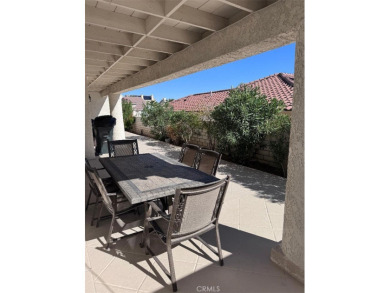 Beautifully maintained and cared for 5 bedroom 3 bath home in on Spring Valley Lake Country Club in California - for sale on GolfHomes.com, golf home, golf lot